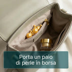 Porta un paio di perle in borsa